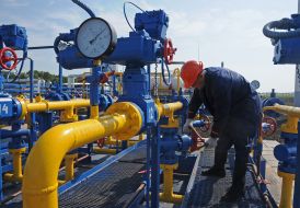 The operator turns the valve