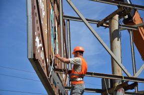 Dismantling of illegal billboard