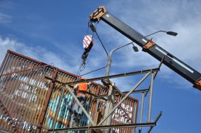 Dismantling of illegal billboard