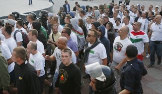 Law enforcement officers cordoned off the Polish football fans