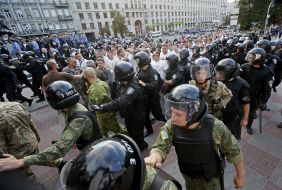 Law enforcement officers cordoned off the Polish football fans