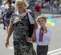 An elderly woman with a boy