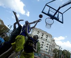 Young men playing basketball