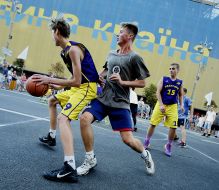 Young men playing basketball