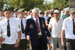 Participants in the ceremony of laying flowers