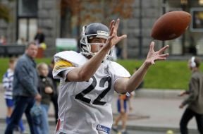 Young people playing on American football