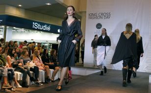 The models demonstrate clothes