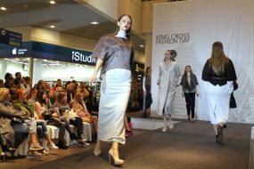 The models demonstrate clothes