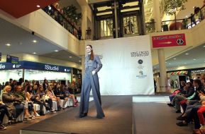 The model demonstrates clothes