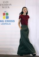 The model demonstrates clothes