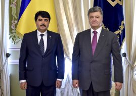 Fayzullo Kholboboev and Petro Poroshenko