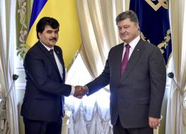 Fayzullo Kholboboev and Petro Poroshenko
