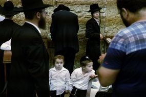 Hasidim pray near the Western Wall