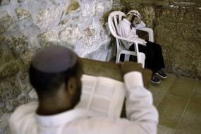 Hasidim pray near the Western Wall