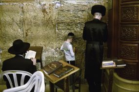Hasidim pray near the Western Wall
