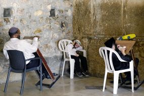 Hasidim pray near the Western Wall