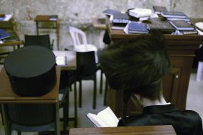 Hasidim pray near the Western Wall