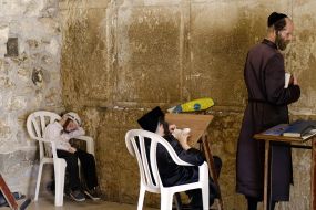 Hasidim pray near the Western Wall