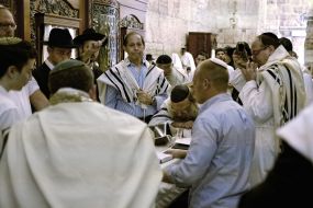 Hasidim pray near the Western Wall
