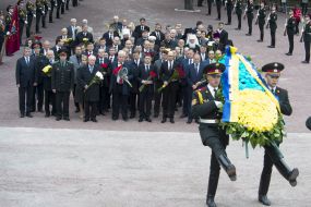 Laying flowers at the monument at Babi Yar
