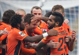 Players of FC "Shakhter" rejoice scored the ball