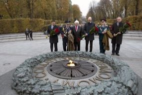Participants in the ceremony of laying flowers