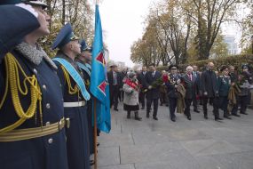 Participants in the ceremony of laying flowers