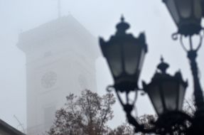 Lviv city hall in fog