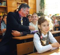 Istvan Hrezha with schoolchildren