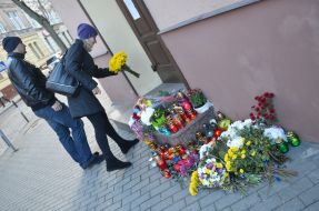 Flowers and candles at the Consulate of France