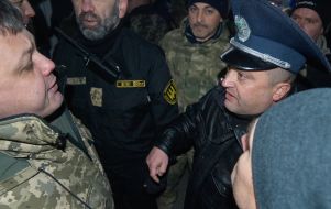 Opposition demonstrators and law enforcement