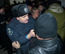 Opposition demonstrators and law enforcement