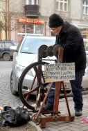 The man sharpens scissors