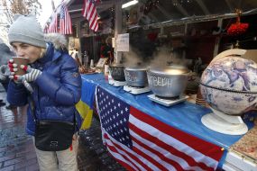 Girl drinks mulled wine
