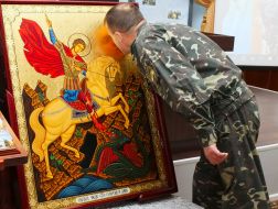 Presentation a prayer book for the soldiers