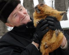 Victor Tokarskiy with marmot Timka