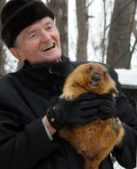Victor Tokarskiy with marmot Timka