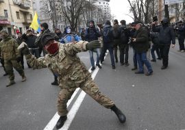 A man throws a stone in the department of "Sberbank of Russia"