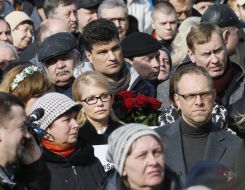 Yuliia Timoshenko, Mikhail Livinskiy and Sergei Vlasenko