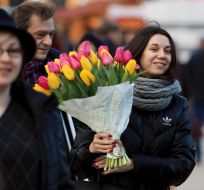 Girl with a bouquet of tulips