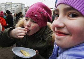 Children eating pancakes