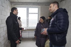Vladimir and Vitali Klitschko and Maria Stus