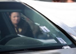 Bullet hole in the windshield of the car