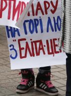 Participants of the rally held up signs