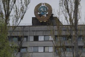 The tallest building in Pripyat with the emblem of the USSR