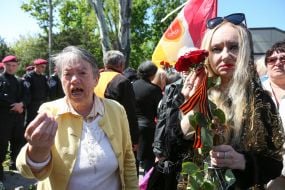 Woman near the law enforcers