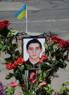 Flowers near the portrait of Andrei Biryukov