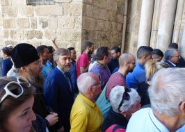 Opening the doors of the Temple of the Holy Sepulchre