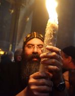 The believer holds the Holy Fire