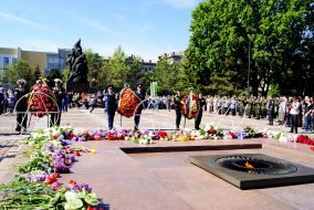Laying flowers at the Eternal Flame